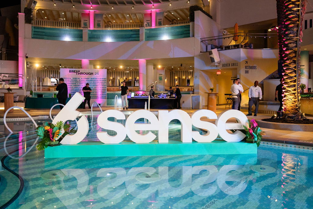 6sense Breakthrough event signage displayed beside a pool at Fontainebleau Las Vegas during a B2B revenue and go-to-market conference.