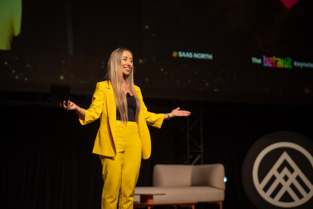 Manuela Bárcenas, Head of Marketing at Fellow.ai, speaking at the SaaS North 2025