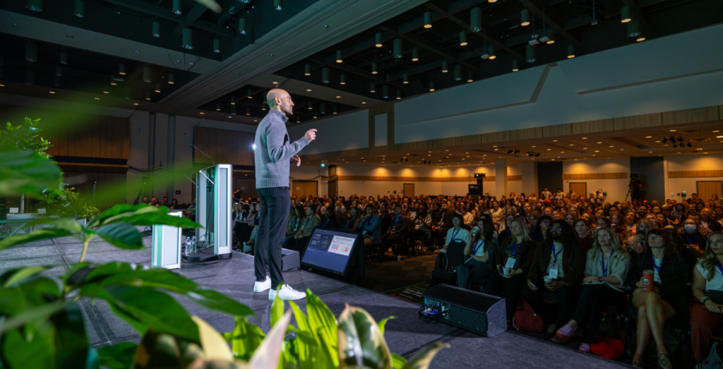 Keynote speaker Neil Patel, Co-Founder of NP Digital, speaking at the 2025 SocialWest conference