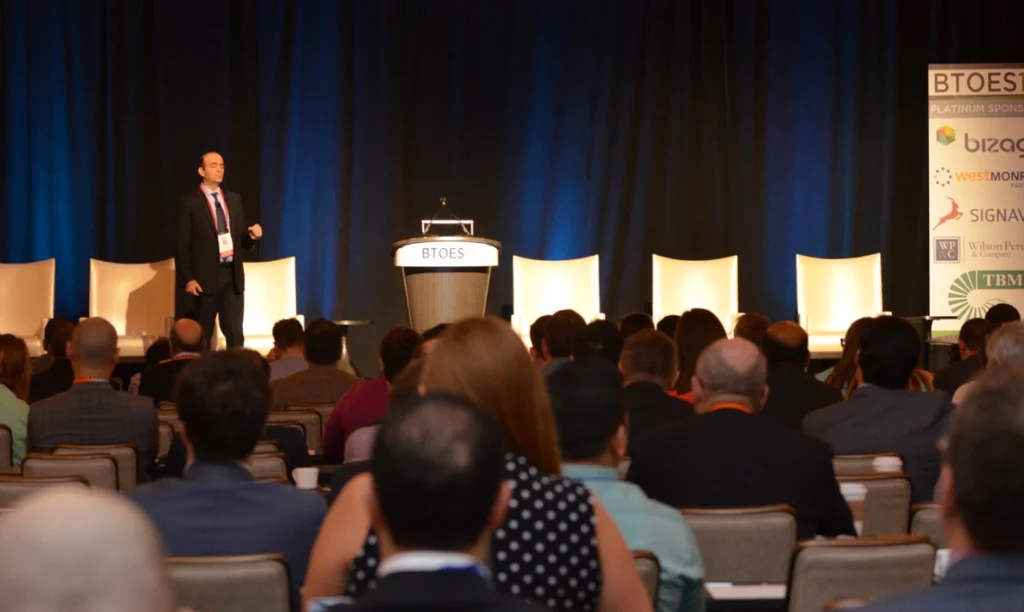 Speaker presenting to an audience at a BTOES conference session